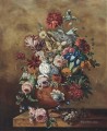 Roses carnations parrot tulips morning glory and other flowers in a sculpted urn and an egg nest Jan van Huysum